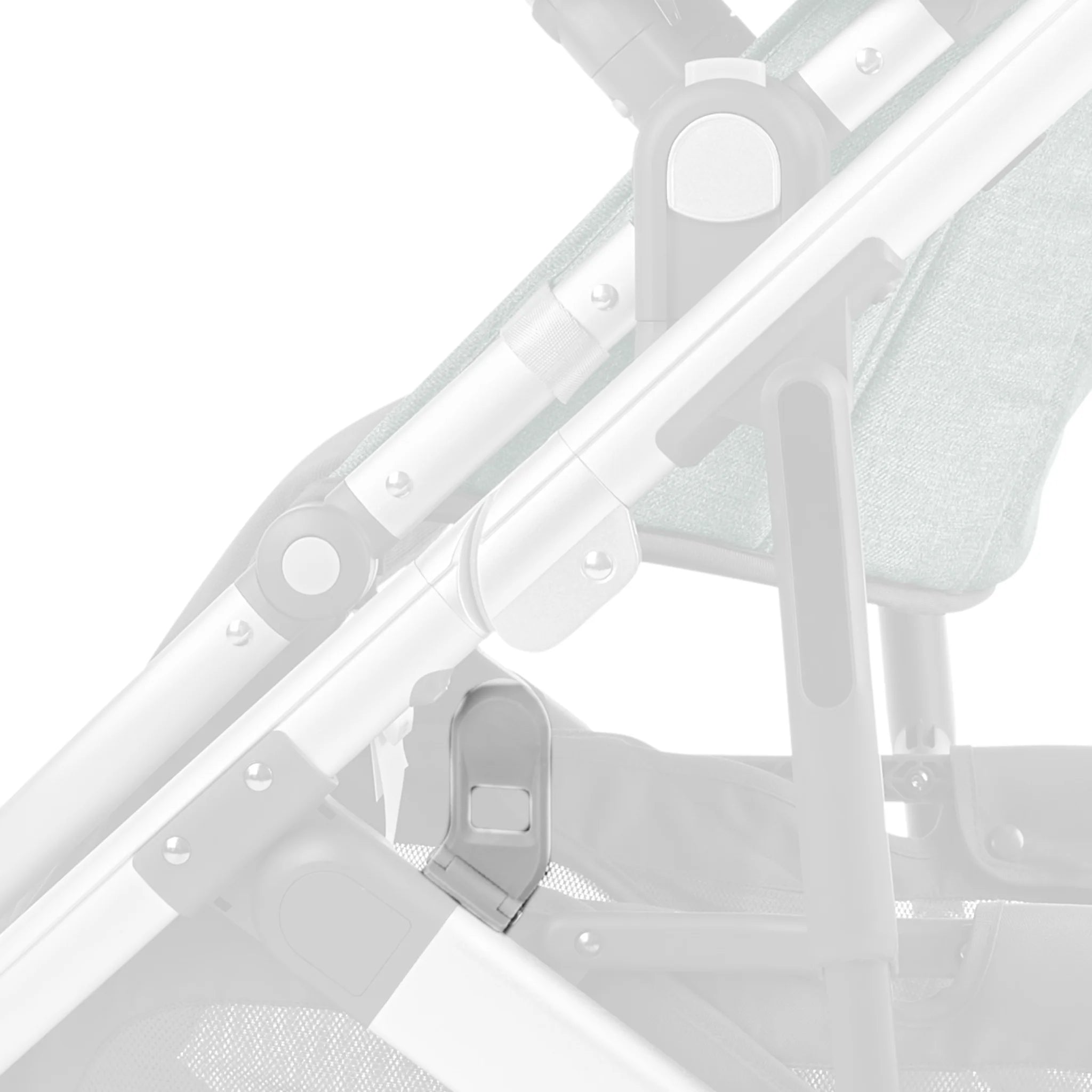 Close-up of a silver lock latch component attached to the frame of a UPPAbaby Cruz V2 stroller, with the stroller softly faded into the background on a white backdrop.