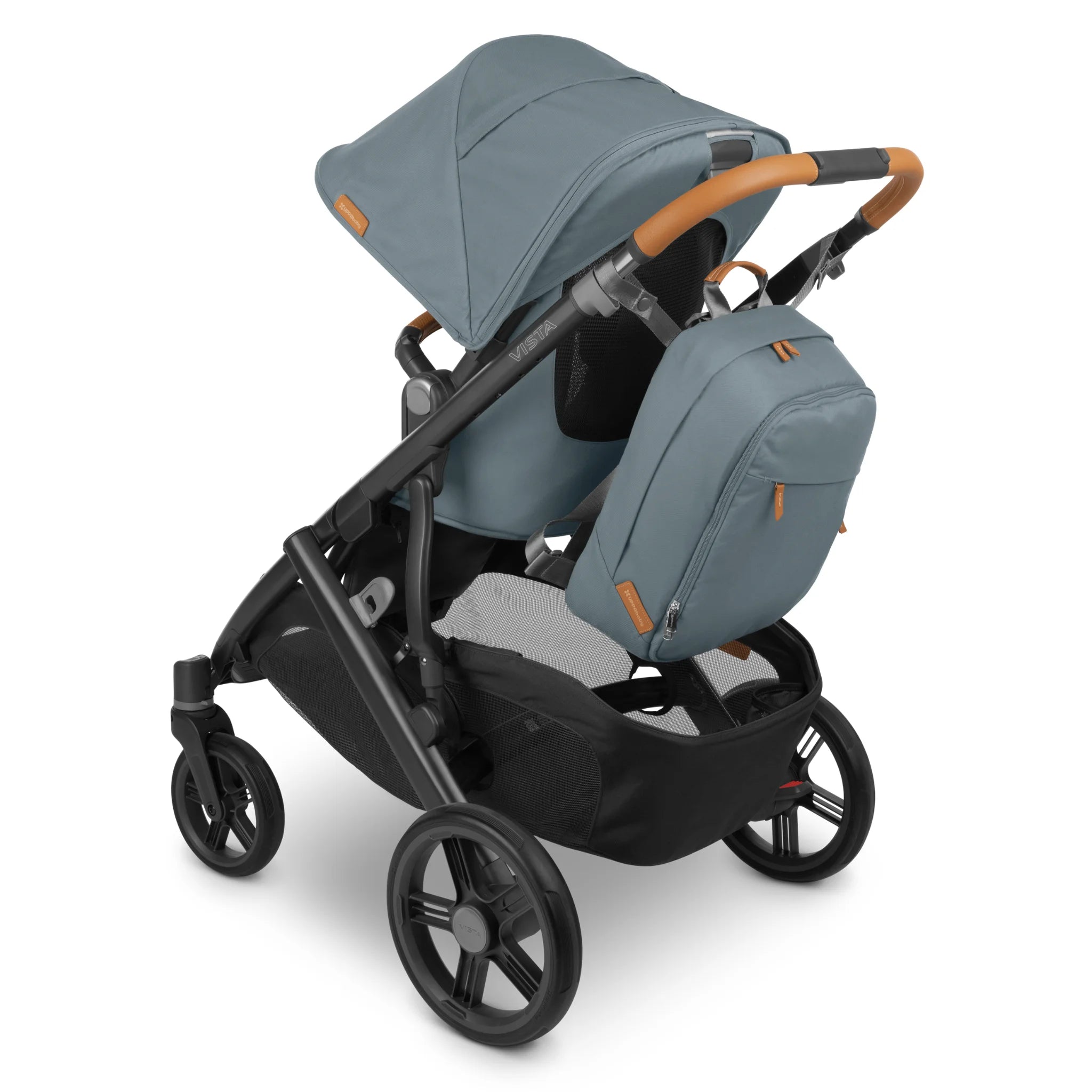 Slate blue UPPAbaby stroller with matching changing backpack attached to the handlebar, shown on a white background.