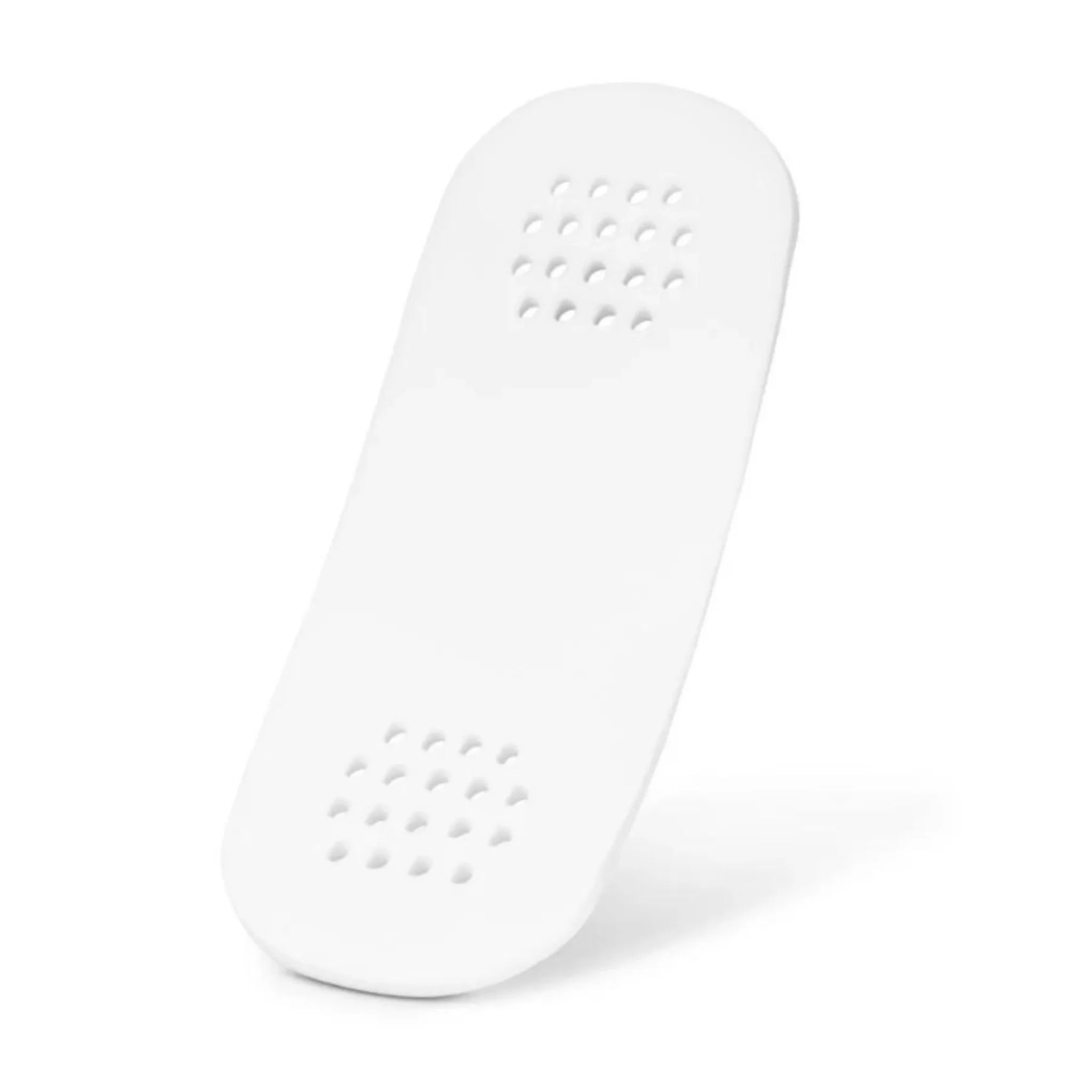 This is a product shot of the UPPAbaby Carrycot mattress without a cover, showing the breathable holes.