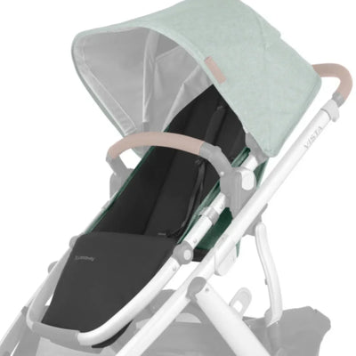UPPAbaby Cruz replacement seat fabric in Gwen, black stroller seat with green canopy on white frame