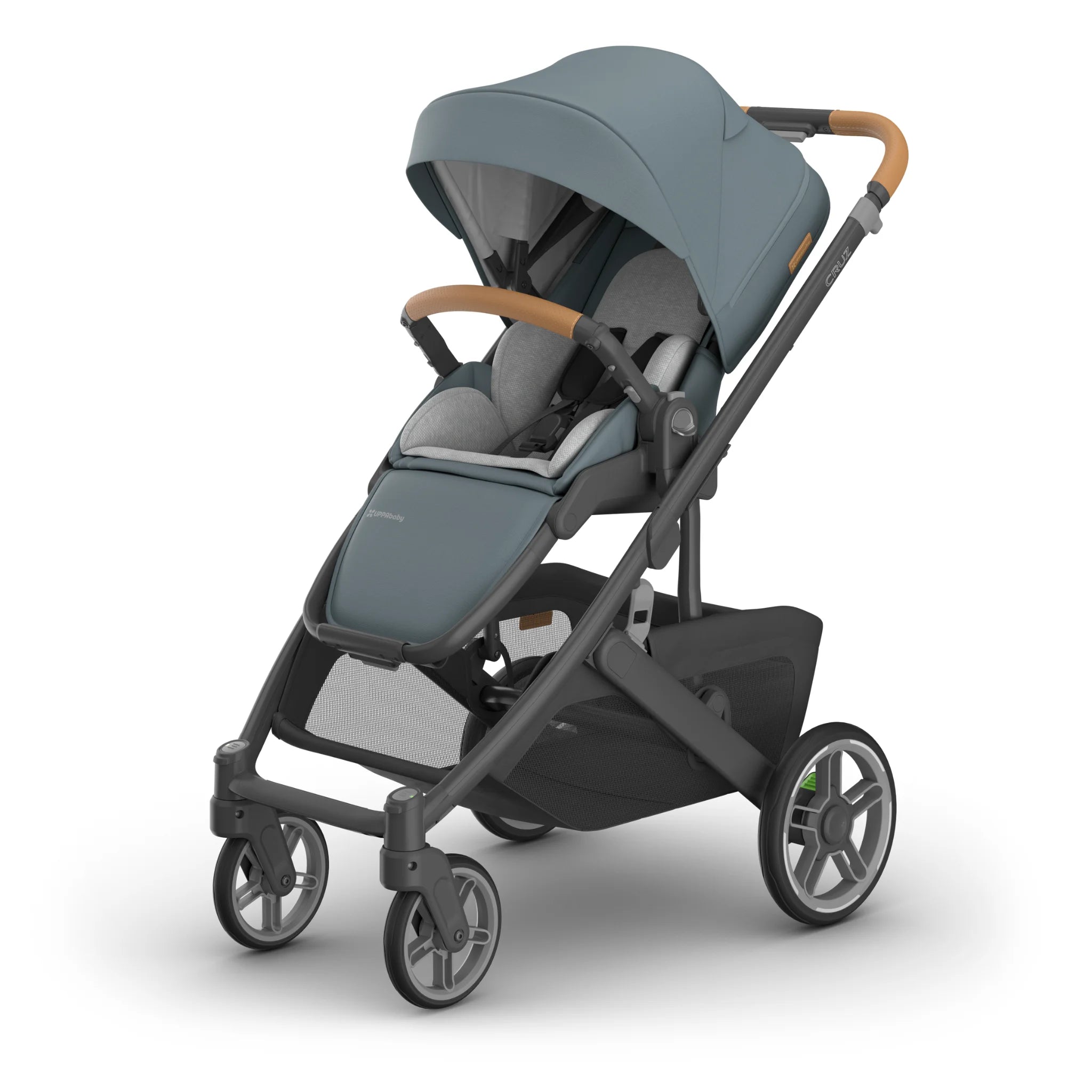 UPPAbaby Cruz single pram in Dillan with newborn insert on white background.