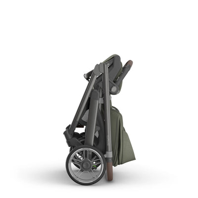 Compact fold of the Cruz V3 stroller in Evelyn on a white background.