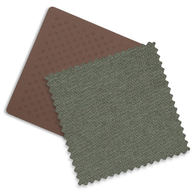 Close up of the chestnut leather and meadow green fabric on the Evelyn fashion.