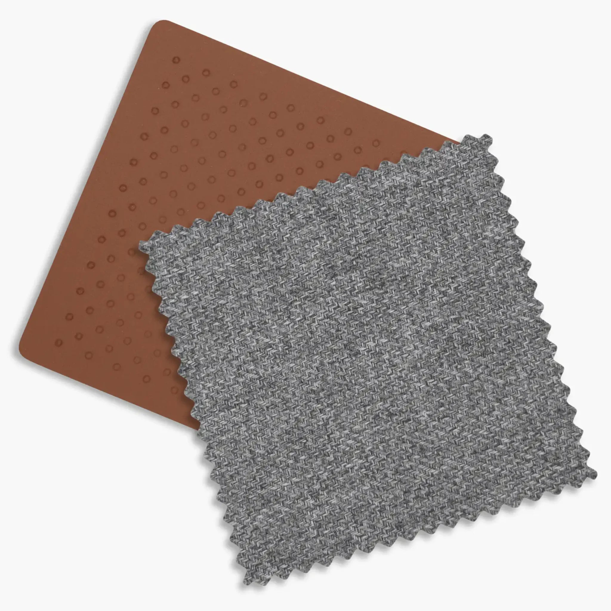 Close up of the saddle leather and the charcoal melange fabrics of the Greyson fashion.