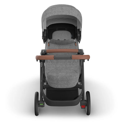 Front view of the UPPAbaby Cruz V3 Infant Cover in Greyson, featuring a grey melange newborn enclosure and protective canopy.