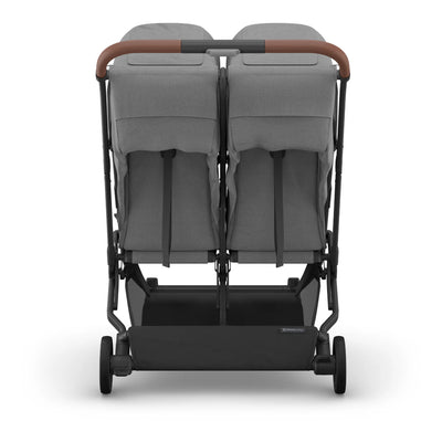 Back of Minu Duo in Greyson showing large basket and independent recline feature.