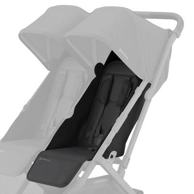 Black replacement seat fabric installed on the right side of a UPPAbaby Minu Duo double stroller frame, shown on a white background with the opposite seat faded out.