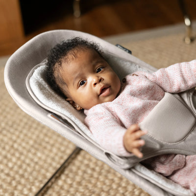 Baby relaxing in UPPAbaby Mira baby bouncer in Charlie