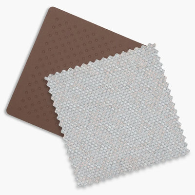 Swatches of the chestnut leather and pearl grey jacquard of the Savannah fashion.