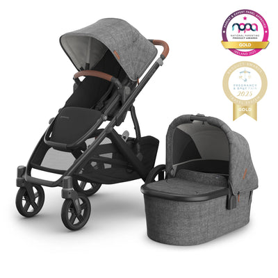 Grey Vista pram with matching bassinet on white backround and gold awards logos.