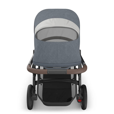 Top down view on the Vista pram in Julian showcasing the mesh peek-a-boo window and the large basket.