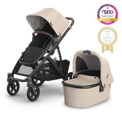 Vista beige Liam fashion on a white background with gold award logos.