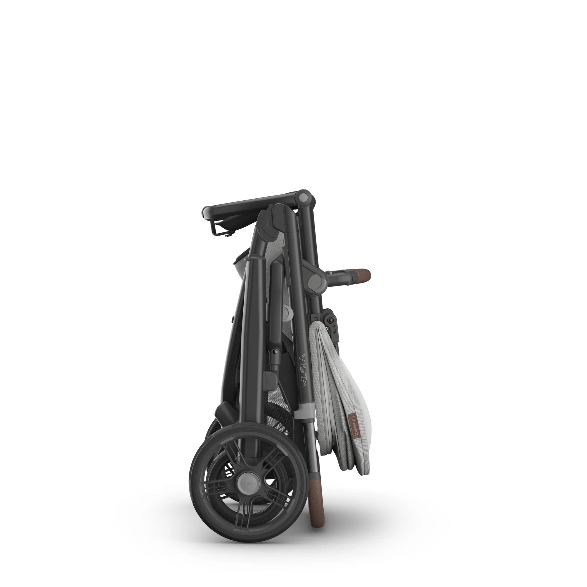 Compact fold of the Vista pram on a white background.