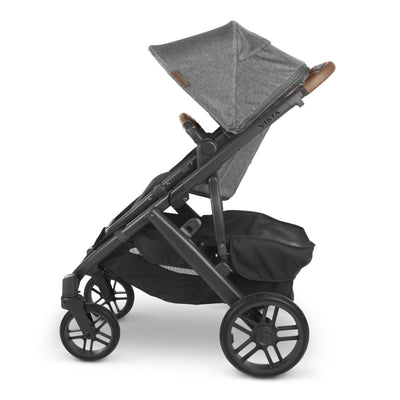 Side view of UPPAbaby Vista stroller with basket cover fitted over the underseat storage