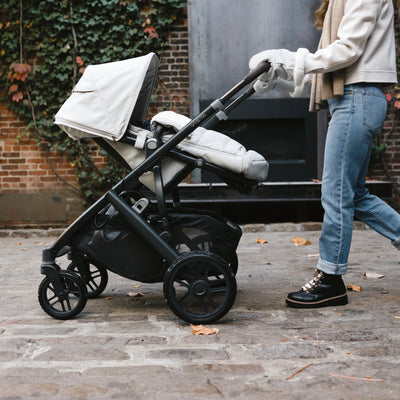 Mum pushing vista buggy with all terrain wheels outside. 