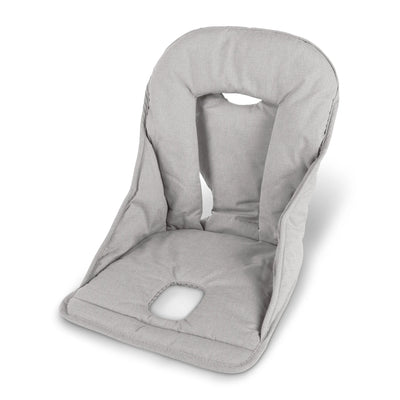 Grey high chair accessory cushion on white background. 