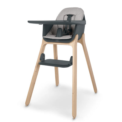 High chair cushion accessory on a high chair with table, on a white background. 