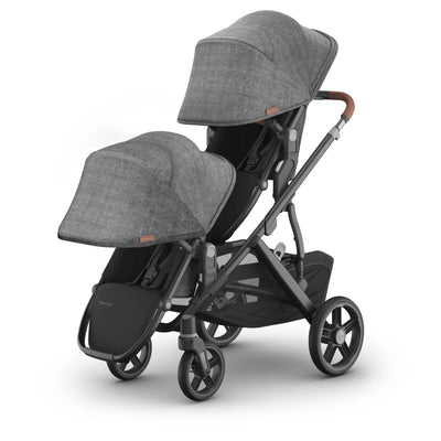 Double rumbleseat in greyson with sunshade extended on the vista on a white background.