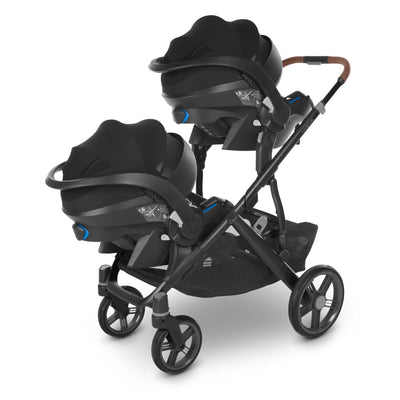 Vista lower car seat adapters in use on a vista stroller frame.